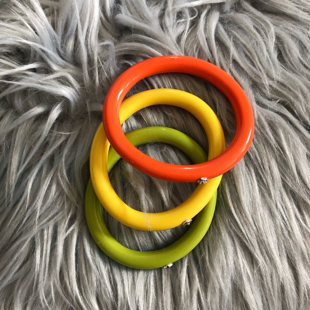 Henri Bendel color bangles logo on each bracelet